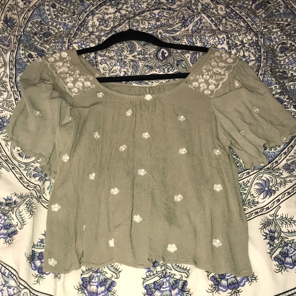 women’s green blouse